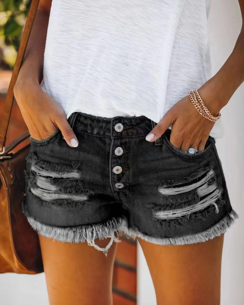 Pantalones cortos vaqueros con borlas